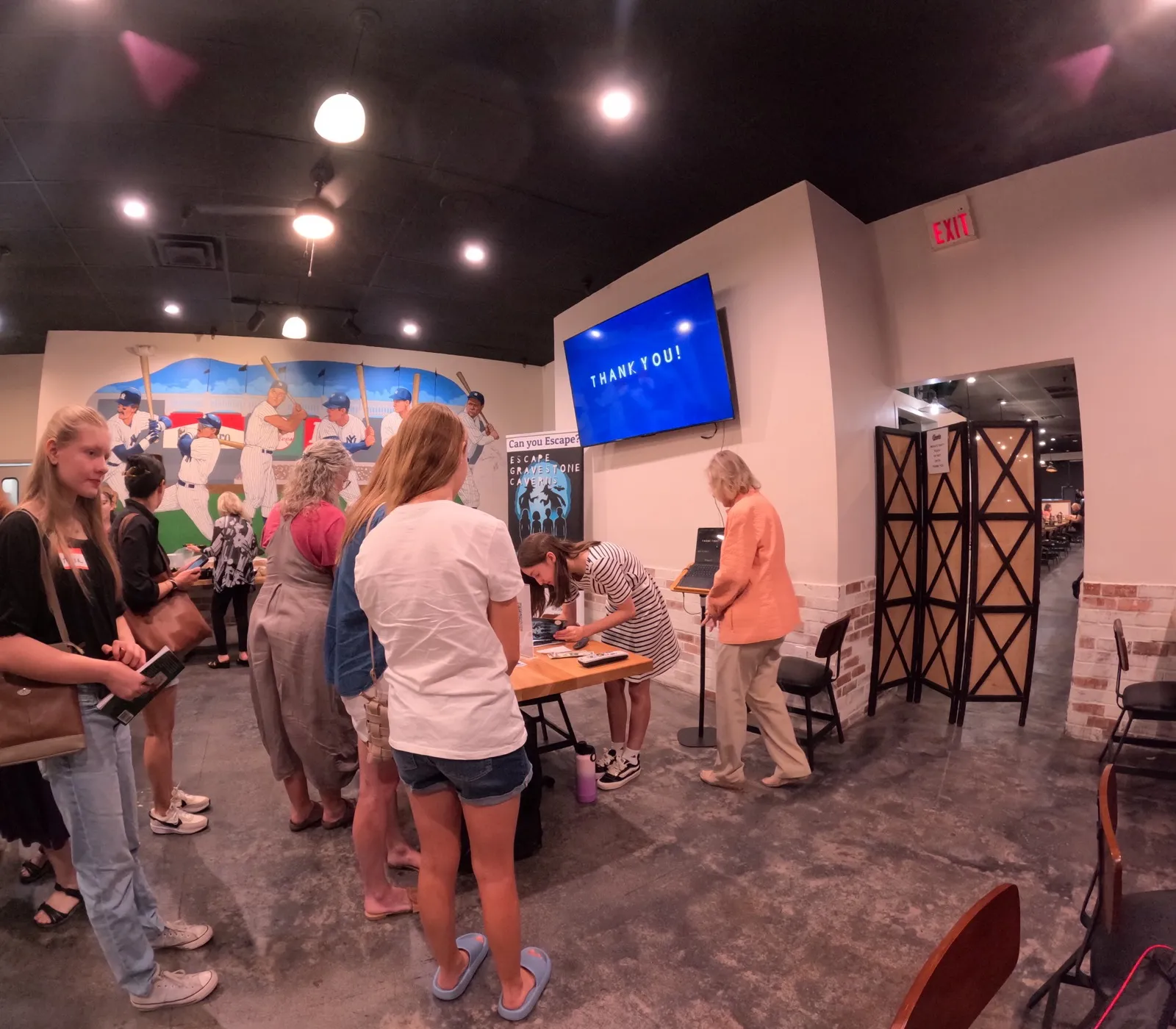 People lining up to buy and get book signed